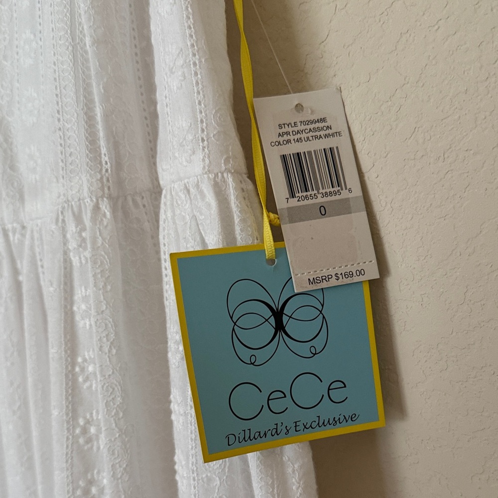 CeCe White Ruffle Sleeveless Dress with Racerback Ruffle Design - Picture 4 of 8